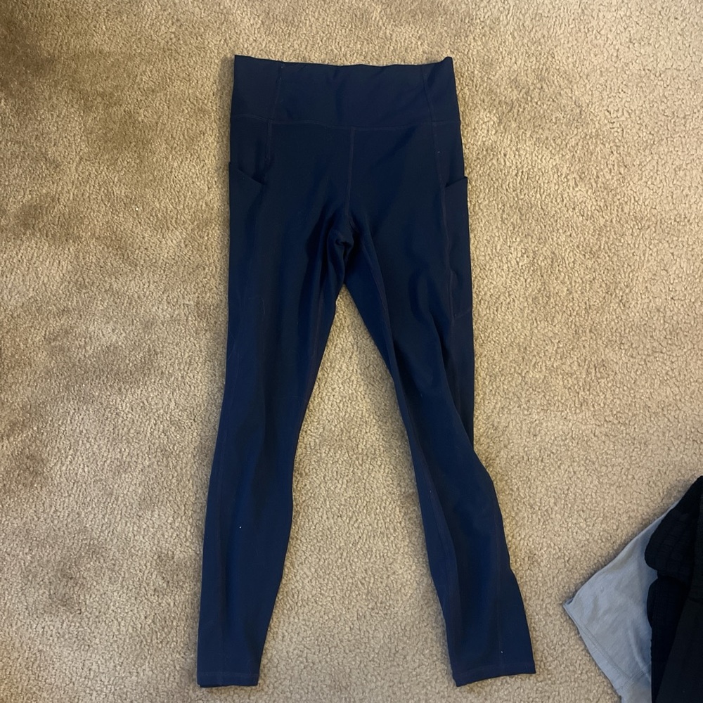 Navy blue Fabletics leggings with pockets